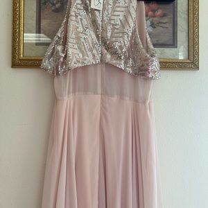 peach colored dress small silver sequin on the bodice.